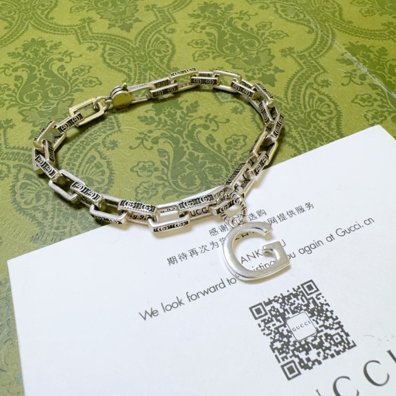 G*u*i bracelets
